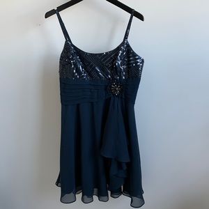 Fun sequin dress with straps and gem flower